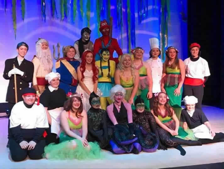 High school music program featuring the cast of The Little Mermaid.